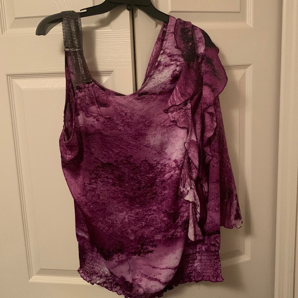 Sassy one shoulder blouse.